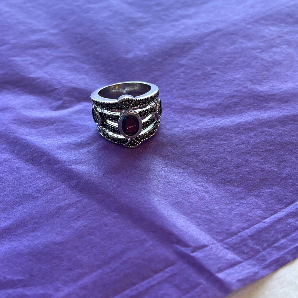 Silver plated ring.
